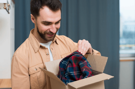 Man receiving a custom-printed shirt as a holiday gift